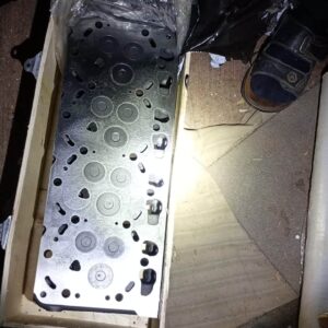 Chiulasa motor Kubota V3300 12 supape piesa noua OEM vedere frontala