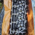 Chiulasă motor Isuzu 4HK1 – Performanță japoneză pentru utilaje industriale care nu au voie să se oprească