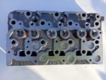 Chiulasa motor Kubota D1703 OEM originala cu garnitura metalica inclusa – compatibila Bobcat Bomag