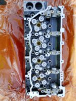Chiulasa motor Isuzu 4HK1 piesa originala compatibila utilaje camioane motoareindustriale.com